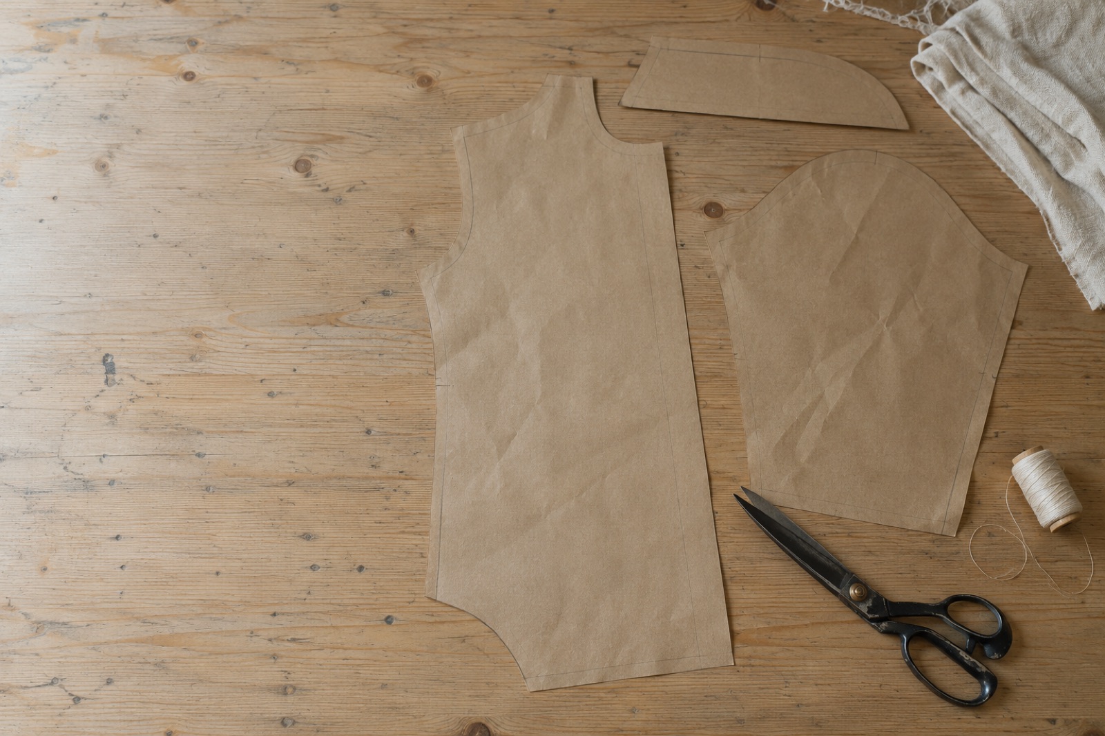 Paper pattern pieces and tailor's shears