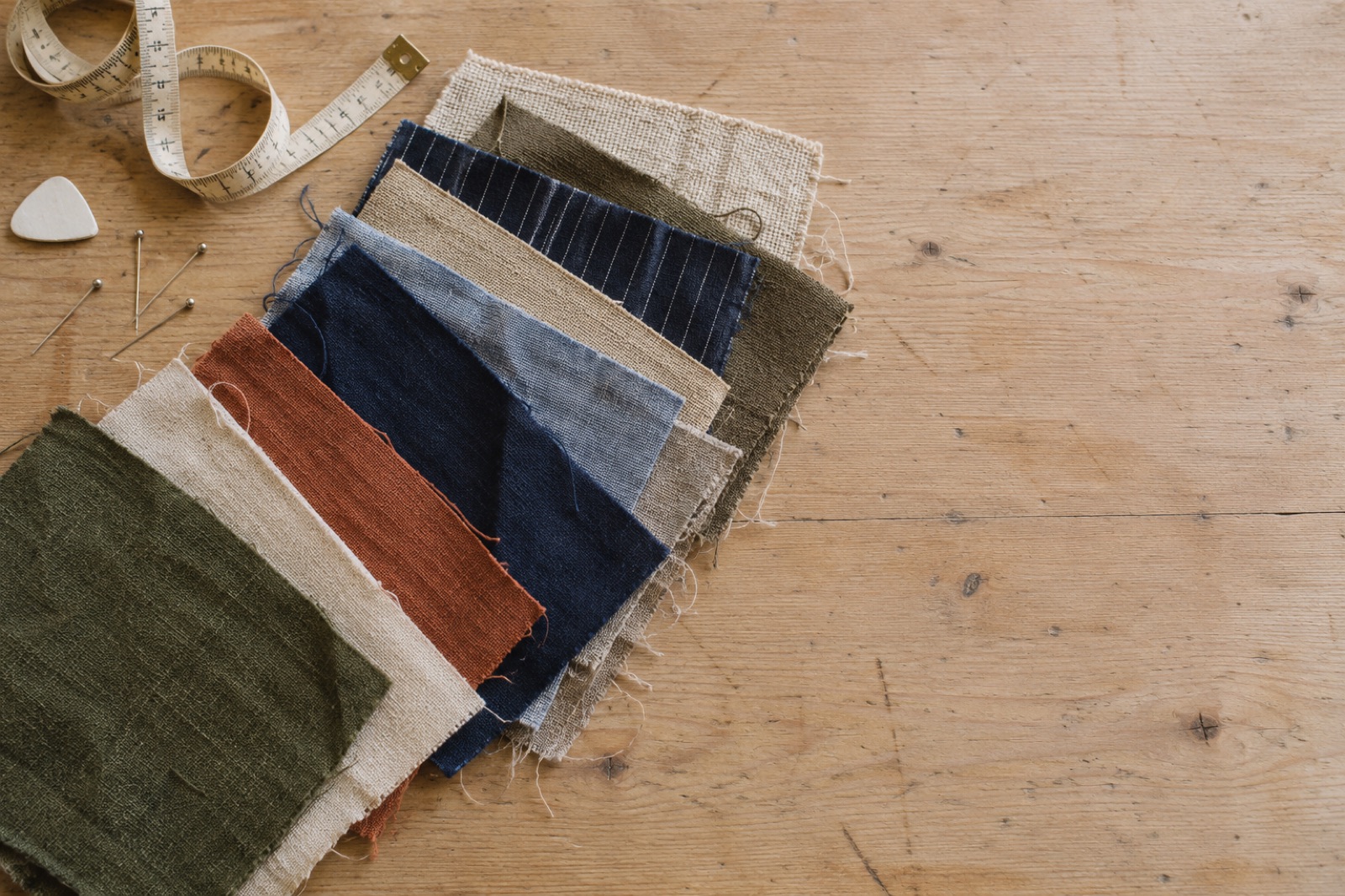 Fabric swatches on a cutting table